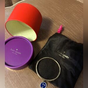 NWOT KATE SPADE “LEO” charm gold tone hinged bangle with dust bag and gift box